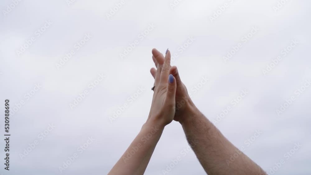 Two passionate hands touching in love Two passionate hands touching in love