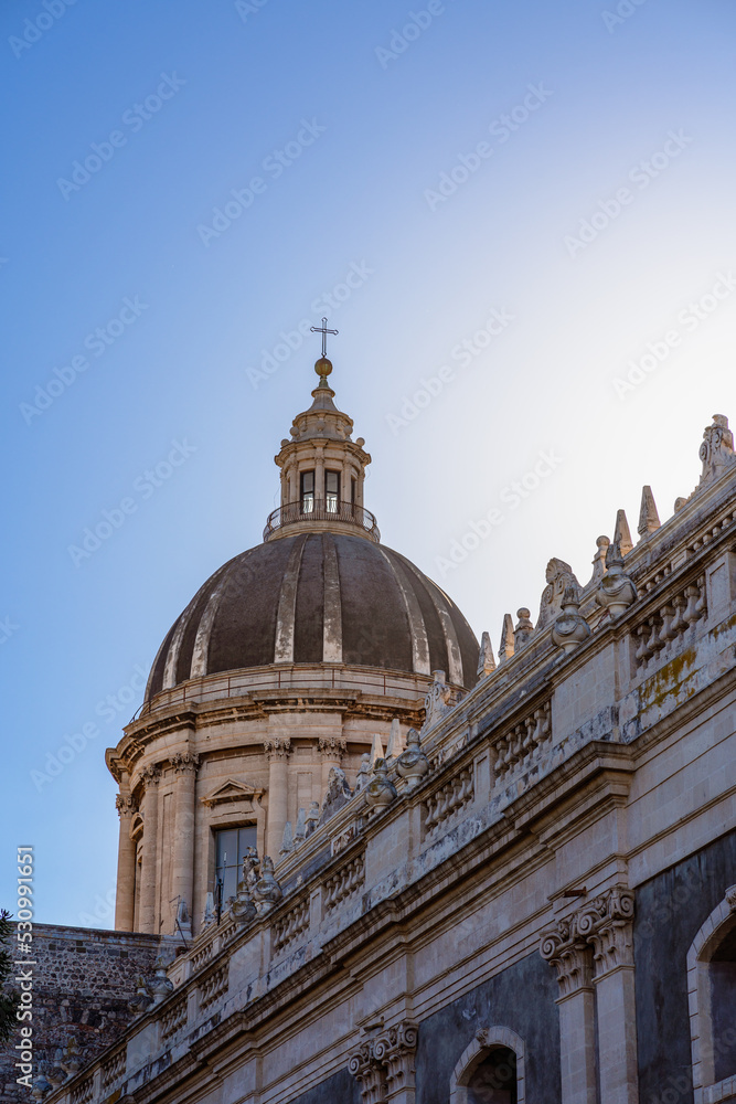 Cupola of Catania Cathedral against blue sky in Sicily, Italy