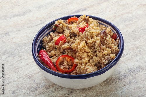 Arabic cous cous with meat and tomato