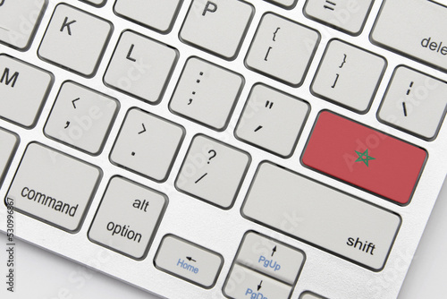 national flag of morocco on the keyboard on a grey background .3d illustration