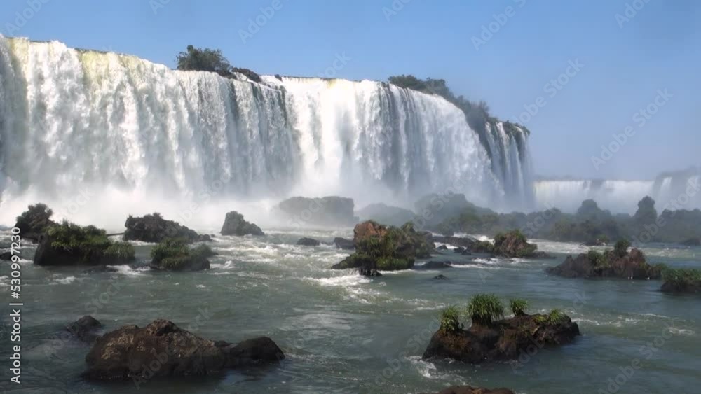 low angle view of beautiful Iguazu falls, in Brazil Argentina border. UNESCO World Heritage Site low angle view of beautiful Iguazu falls, in Brazil Argentina border. UNESCO World Heritage Site