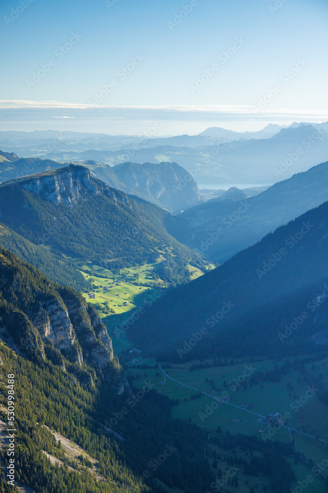 view over Diemtigtal on a summer morning with Lake Thun in the distance