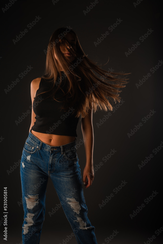 Posing while her hair is in movment Posing while her hair is in movment