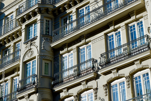 Elegant modernist facade downtown on Atocha street in Madrid, Spain