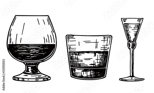 Set of hard strong alcoholic drinks and spirits in glasses in assortment. Sketch. Ink sketch isolated on white background. Hand drawn vector illustration. Retro style.
