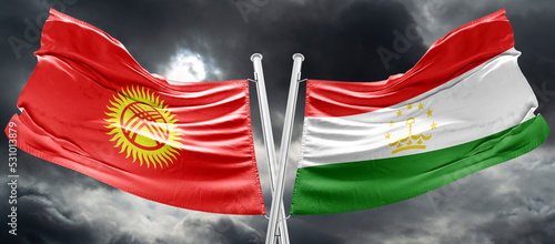 Conflict Kyrgyzstan and Tajikistan, war between Kyrgyzstan vs Tajikistan, fabric national flag Kyrgyzstan and Flag Tajikistan, war crisis concept. photo