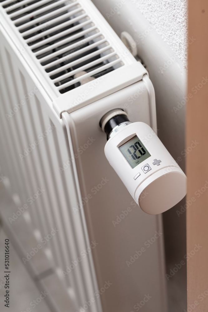 Woman's hand adjusting temperature. Woman's hand adjusting temperature.