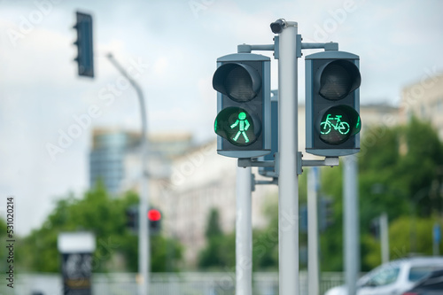 Pedestrian and bicycle traffic light on city street, space for text