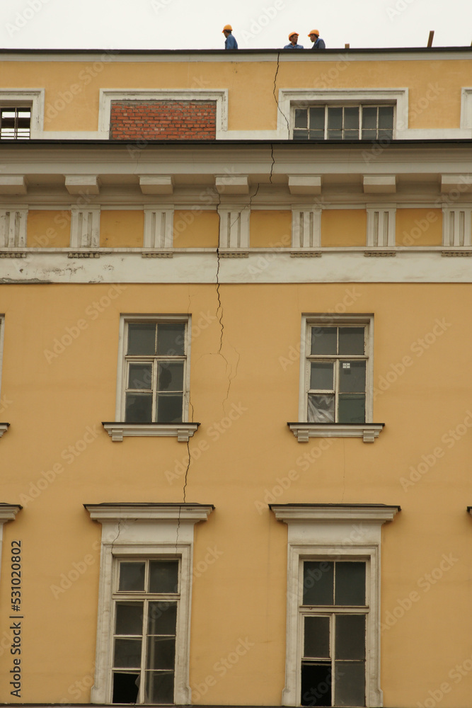 Russia. Saint-Petersburg. Major renovation of a residential building. Crack on the facade.