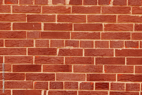 Brown background of beautiful unusual building brick © yarbeer