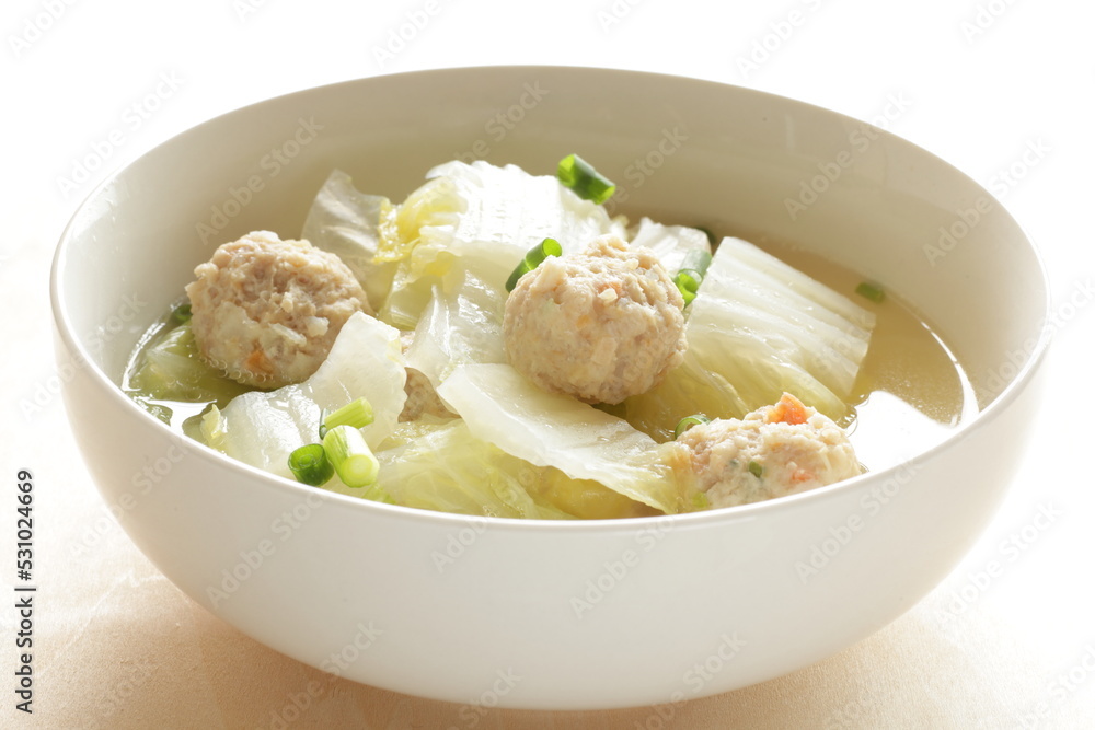 Chicken meat ball and Chinese cabbage soup in white bowl for winter hot pot food image Chicken meat ball and Chinese cabbage soup in white bowl for winter hot pot food image