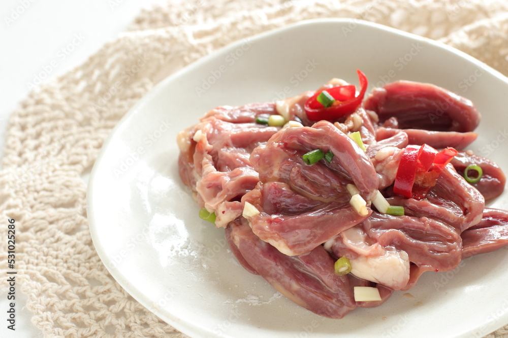 Chinese cooking, prepared Chicken heart and spring onion seasoning marinade 