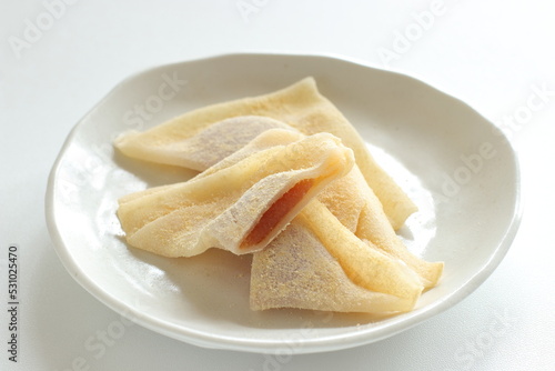Japansese sweet food, Kyoto sweet potato paste in sticky rice in triangle shape for regional confectionery 