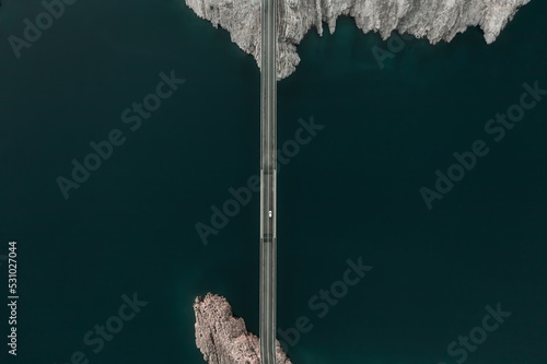 Aerial view Paski bridge in Croatia road above sea connecting islands top down scenery transportation infrastructure famous landmarks croatian landscape