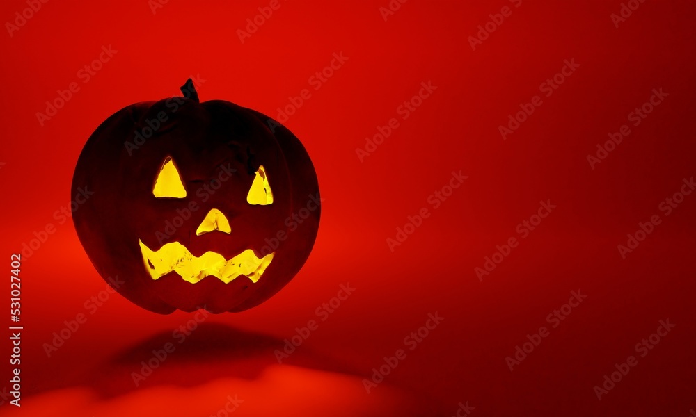 3d illustration,carved pumpkin horror image with light inside, red background ,copy space,3d rendering 3d illustration,carved pumpkin horror image with light inside, red background ,copy space,3d rendering