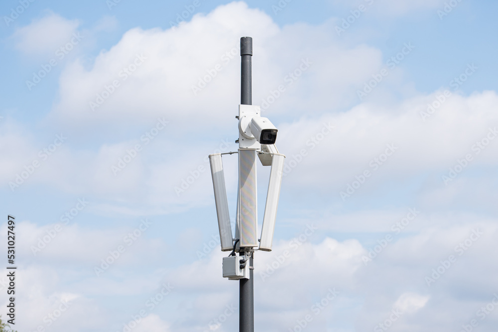Surveillance camera in the area, street security, face recognition. Security system Surveillance camera in the area, street security, face recognition. Security system