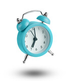 Isolated blue alarm clock flying over white background.