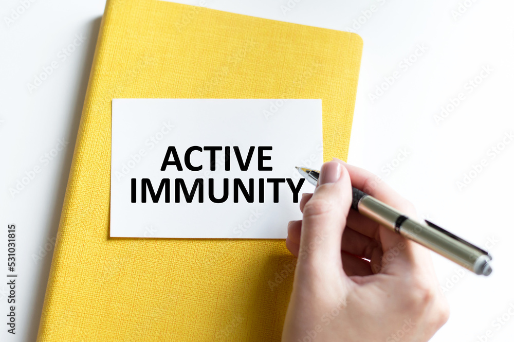 Text Active Immunity on the white card. Medical concept photo Text Active Immunity on the white card. Medical concept photo