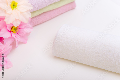 Towels and flowers in beauty spa