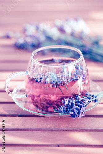 Glass cup of lavender tea.