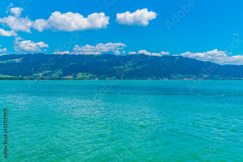 Germany  Beautiful panorama view above lakeside of turquoise bodensee lake water at austria coast and bregenz city  pfaender mountain