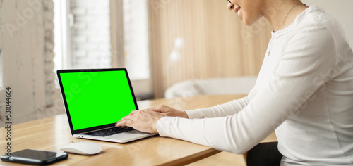 Workplace laptop open green screen woman working in office