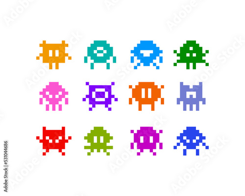 Funny Pixel Monsters vector collection. Abstrcat colorful monsters on white background in 8-bit retro pixel game style. Vintage video game elements for print fabric and backdrop design