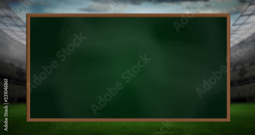 Fotografia Image of game plan on board over sports stadium