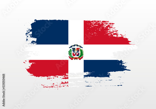 Modern style brush painted splash flag of Dominican Republic with solid background