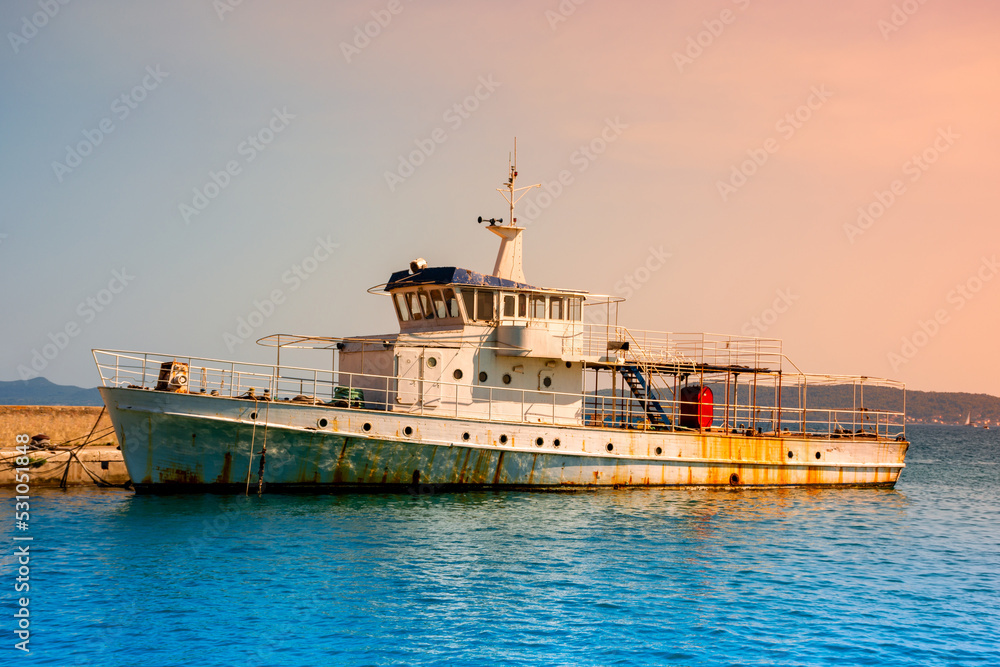 Old sea vessel moored on the shore of the Adriatic Sea