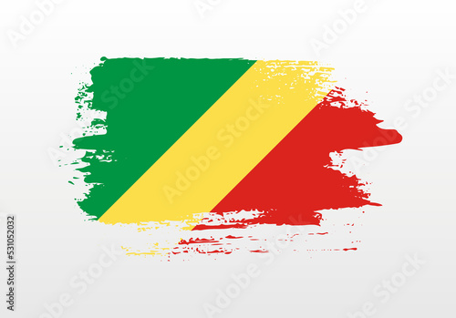 Modern style brush painted splash flag of Republic of the Congo with solid background