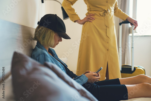 Mom packed a suitcase for the holidays, but her daughter does not want to. photo