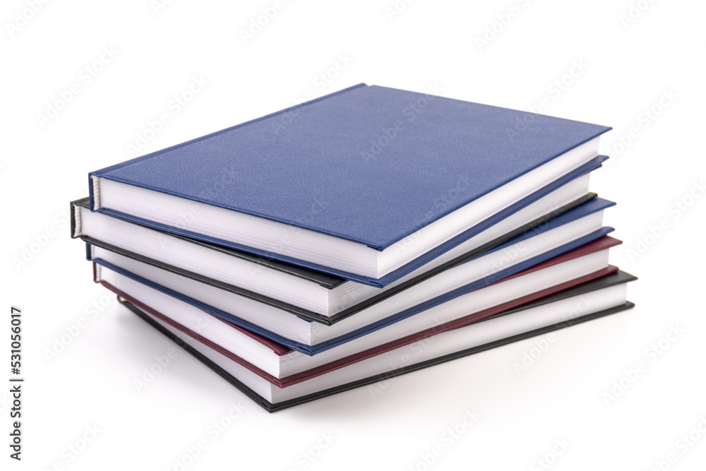 Stacked hardcover notebooks on white background. Education business concept. Stacked hardcover notebooks on white background. Education business concept.