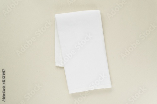 White plain kitchen towel mockup, minimal simple composition with folded blank cotton tea towel for design display.