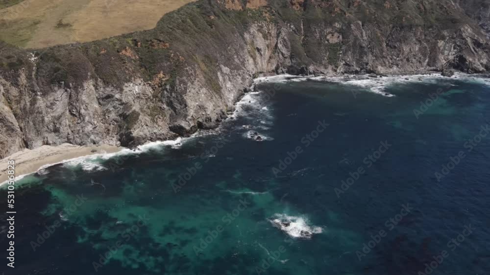 Aerial shot of the rugged coastline along the Pacific Coast Highway in Central California Aerial shot of the rugged coastline along the Pacific Coast Highway in Central California