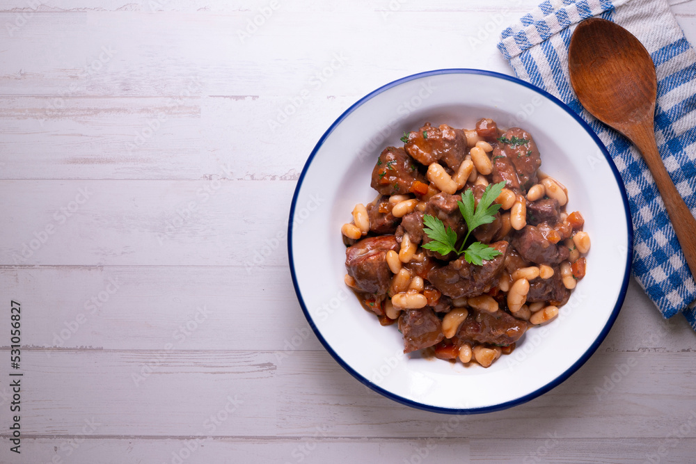 Stewed beef with broad beans and carrot. Traditional northern Spanish tapas. Stewed beef with broad beans and carrot. Traditional northern Spanish tapas.