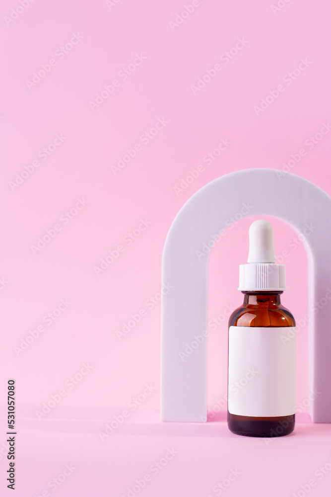Cosmetic bottle with serum in arch. Skin care cosmetic. Hyaluronic acid oil, serum with collagen and peptides. Cosmetic bottle with serum in arch. Skin care cosmetic. Hyaluronic acid oil, serum with collagen and peptides.