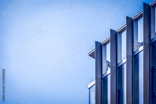 Detail of a modern building against a blue sky, use as a background