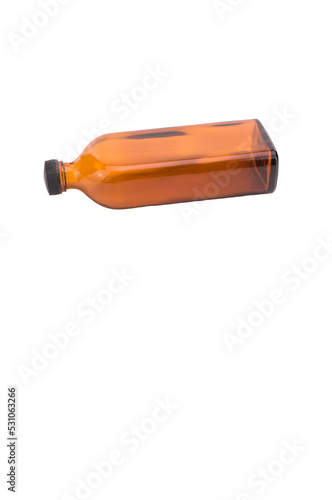 bottiglia vuota con tappo per sciroppi e medicamenti in vetro ocra su sfondo trasparente photo