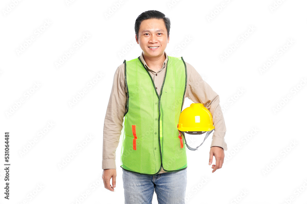 Smiling young Asian civil engineer standing holding yellow hard hat isolated on white background. Smiling young Asian civil engineer standing holding yellow hard hat isolated on white background.