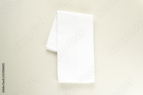 White empty kitchen towel mockup, blank waffle tea towel, minimal composition, top view.