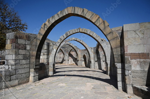 Five arches, the remains of 15th century hilltop Saat Kaman (Seven Arches) monument, part of the Champaner complex, Gujarat, India photo