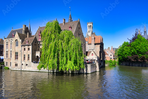 Famous canal of Rozenhoedkaai and the Belfry in the background, Bruges, UNESCO World Heritage Site, Belgium photo