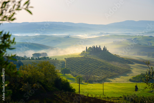 Podere Belvedere farmhouse in spring, Orcia Valley, Tuscany, Italy photo
