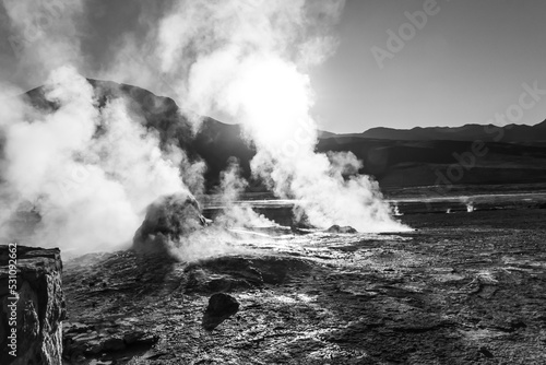 steam and smoke coming out of geysers in the Atacama Desert, Chile