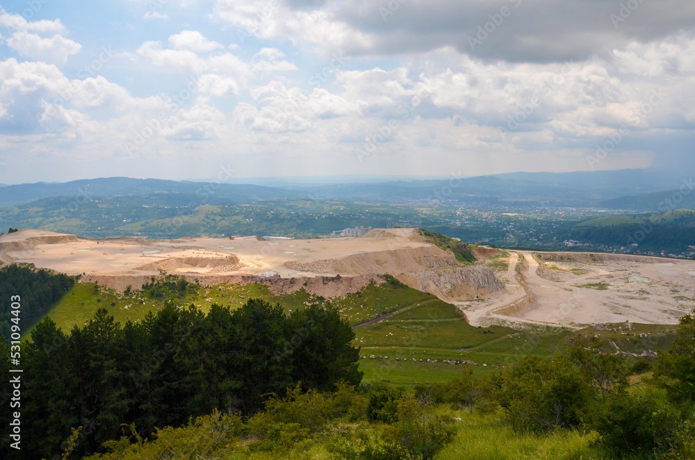 Stone and limestone quarry in the Southern Carpathians, near Campulung, Romania