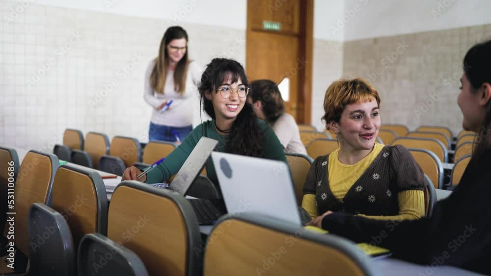 Young people studying in university classroom - School education concept Young people studying in university classroom - School education concept