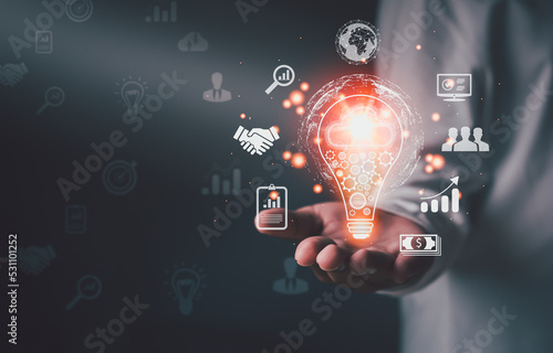 Man hand holding light bulb idea Global Internet connection. Business global internet connection application technology and digital marketing, Financial and banking, Digital link tech, big cloud data