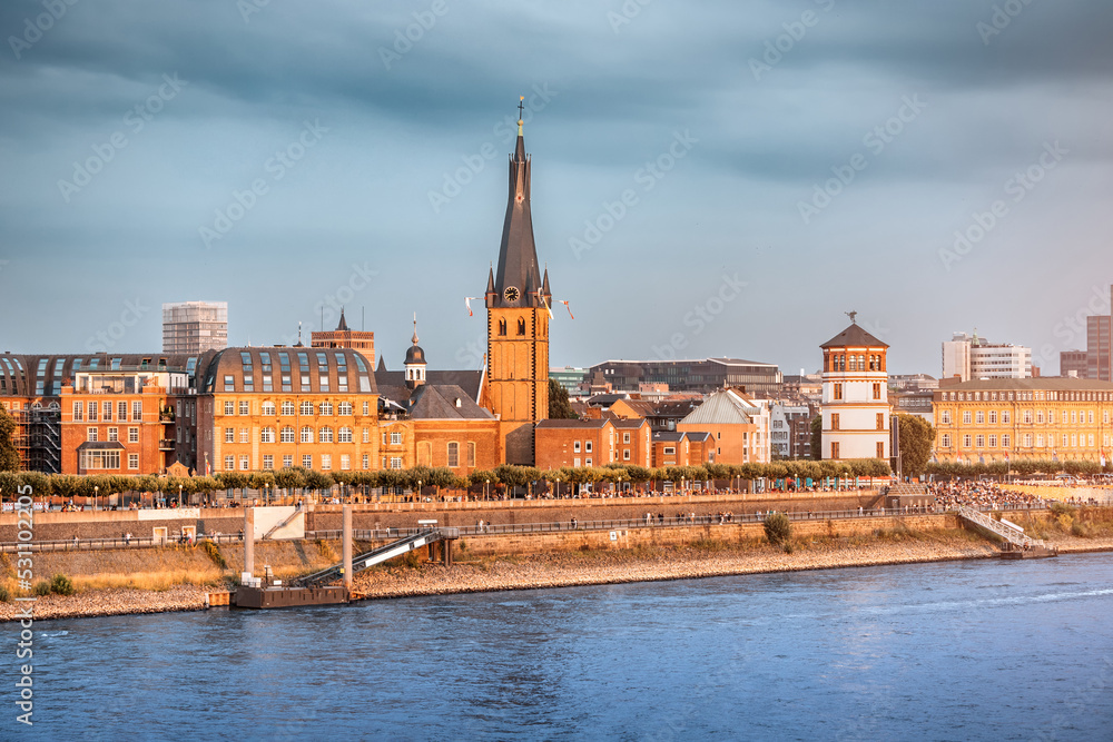 Recognizable architectural towers of the city of Dusseldorf and transportation waterway of the whole of Germany - the Rhine River
