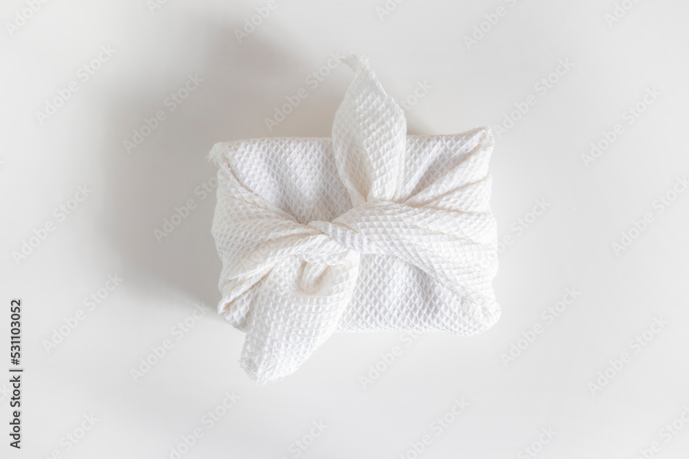 Obraz premium Furoshiki is a Japanese wrapping fabric traditionally used in Asia for gifts. Ecological gifts.